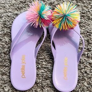 Girls purple flip flops